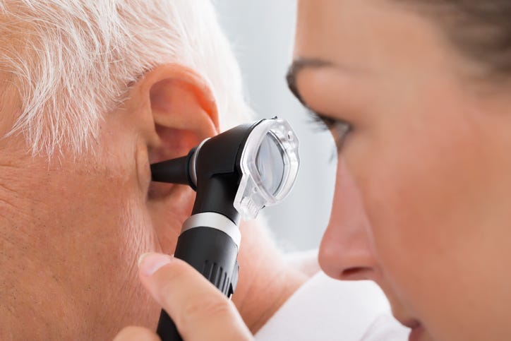 Ear pain getting check out by doctor.