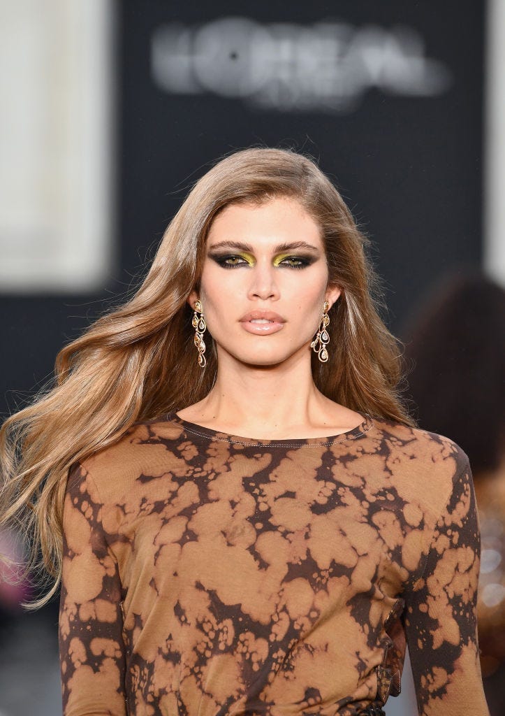 Model Valentina Sampaio struts the catwalk during a fashion show.