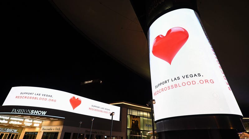 Electronic signs outside the Fashion Show mall on the Las Vegas Strip direct people to support Las Vegas by giving blood to the Red Cross in response to Sunday night's mass shooting at a music festival on October 3, 2017