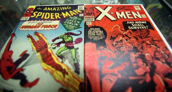 In this photo illustration, vintage Spider Man and X-Men Marvel comic books are seen at St. Mark's Comics August 31, 2009 in New York City. The Walt Disney Co. announced that it plans to acquire Marvel Entertainment Inc. for $4 billion in stock and cash, 