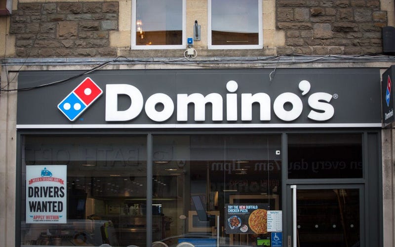 BATH, ENGLAND - FEBRUARY 19: A branch of Domino's pizza takeaway is pictured on February 19, 2018 in Bath, England. The number of takeaway restaurants has increased significantly in the last few years and this has raised concerns that this can lead to ove