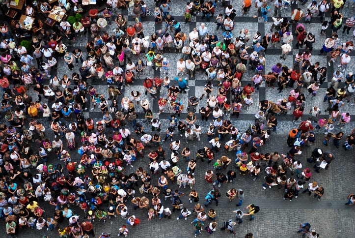Aerial photograph of people gathered in a square