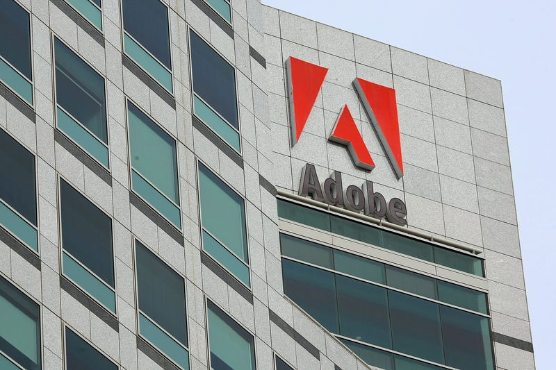 The Adobe logo is displayed on the side of the Adobe Systems headquarters January 15, 2010 in San Jose, California.