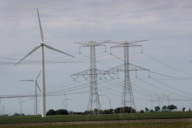 Power lines and power generating windmills