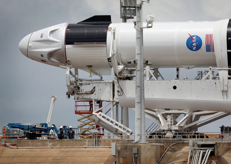Crew Dragon Capsule Atop SpaceX Falcon 9 Rocket Moves Into Position