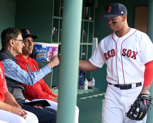 John Henry, Alex Cora and Rafael Devers