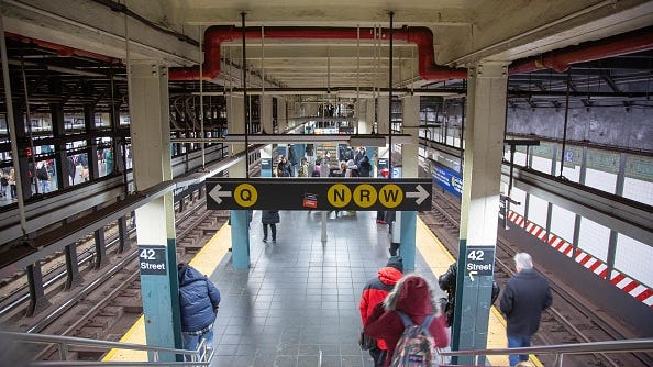Man charged with murder after pushing Asian woman in front of Times Square subway train