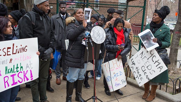 Yellow liquid oozing from floors & mold: NYCHA Bushwick residents, lawmakers demand answers