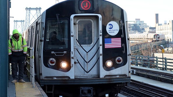 Woman charged with attempted murder in Queens subway shoving
