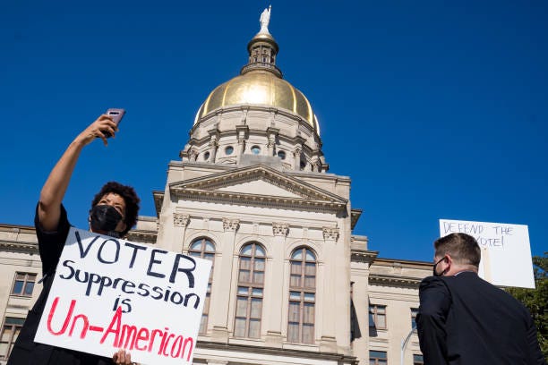 Protesters were at the Georgia Capitol in 2020 rallying against passage of the new election bill that has since become law.