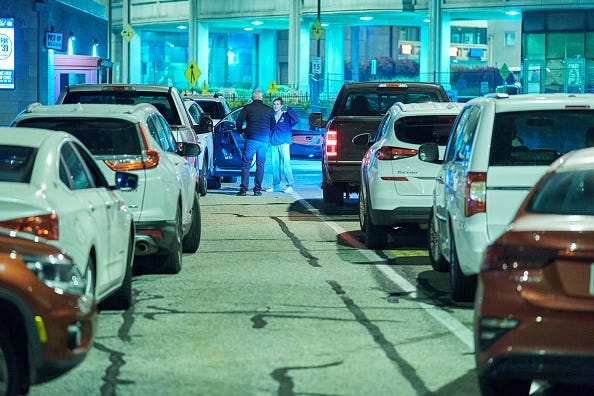 Travelers wait in line to cross the border into the United States across the Rainbow Bridge in Niagara Falls, Ontario