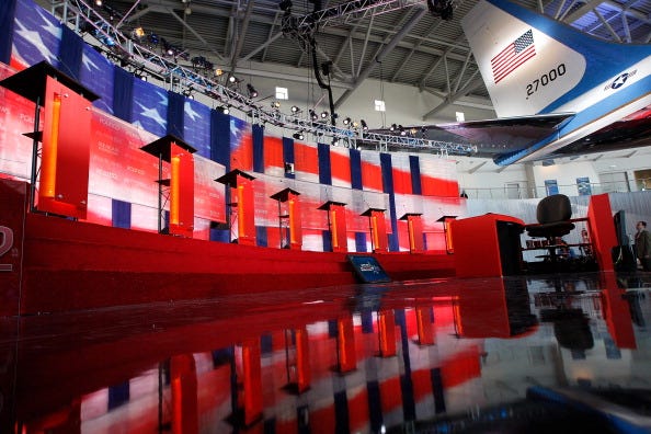 The tail of Air Force One is seen above the stage before a GOP Presidential debate at the Ronald Reagan Presidential Library on September 7, 2011