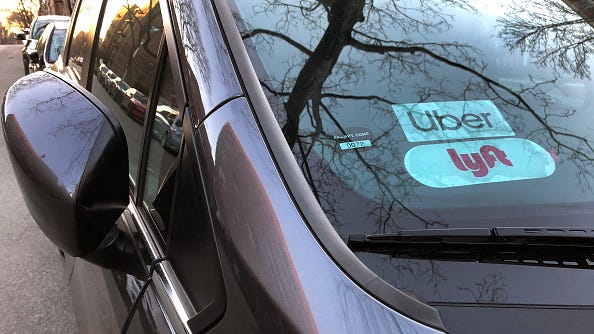 Uber and Lyft drivers stage strike at LaGuardia Airport