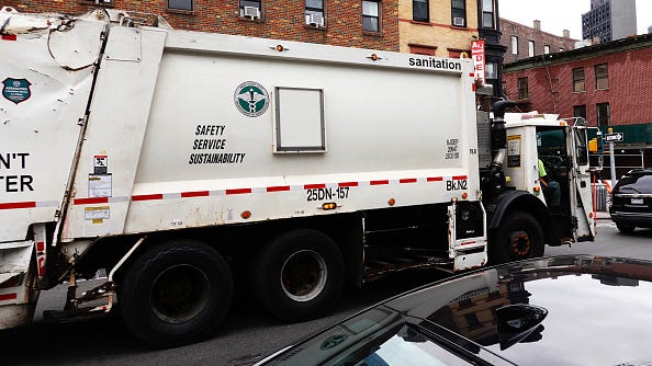 Woman, 39, fatally struck by sanitation truck turning at Brooklyn intersection: NYPD