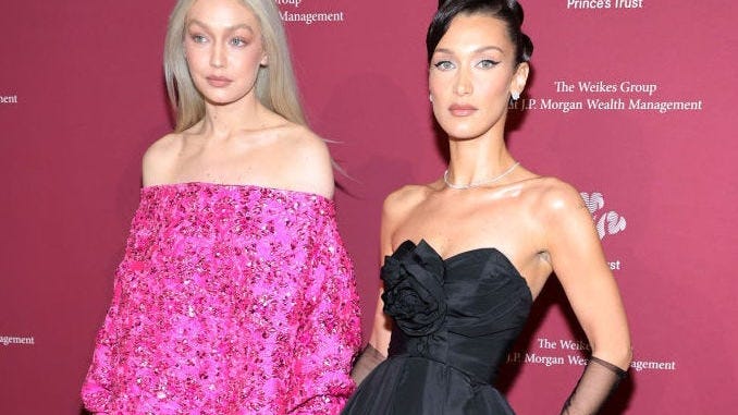Supermodel sisters Gigi and Bella Hadid shock with matching shaved heads at fashion show