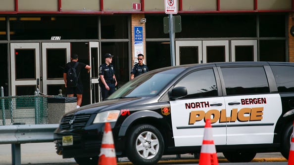 NJ school district to put armed officers in schools