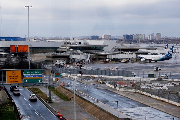  DECEMBER 23: Cars drive near the Terminal 5 at JFK Airport on December 23, 2022 in New York City. Winter weather continues to disrupt holiday travel across the United States, leaving travelers facing delays and cancellations during one of the busiest time of the year. (Photo by Leonardo Munoz/VIEWpress)