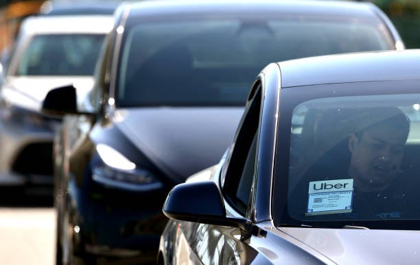 Drivers who say they sometimes wait hours in the ride sharing lot outside the airport waiting to pick up passengers spoke out at a recent Metropolitan Airports Commission meeting to demand better conditions.