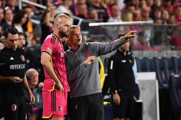 ST. LOUIS, MO - AUGUST 30: Bradley Carnell Head Coach St. Louis City SC gives instructions to Joao Klauss #9 during a game between FC Dallas and St. Louis City SC at Citypark on August 30, 2023 in St. Louis, Missouri.