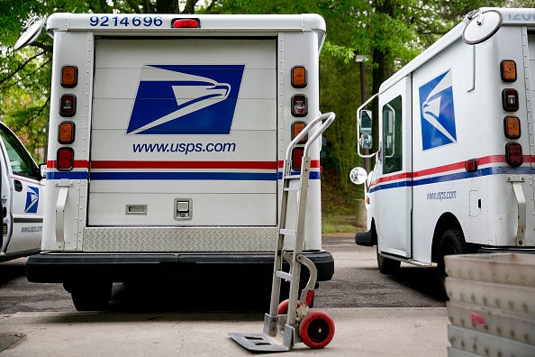 USPS trucks
