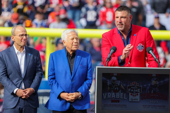 Robert Kraft, Jonathan Kraft and Mike Vrabel
