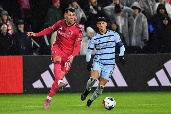 OCTOBER 29: Eduard Lowen #10 of St. Louis City SC passes the ball during game One of the First Round of Playoffs between Sporting Kansas City and St. Louis City SC at CITYPARK on October 29, 2023 in St. Louis, Missouri.