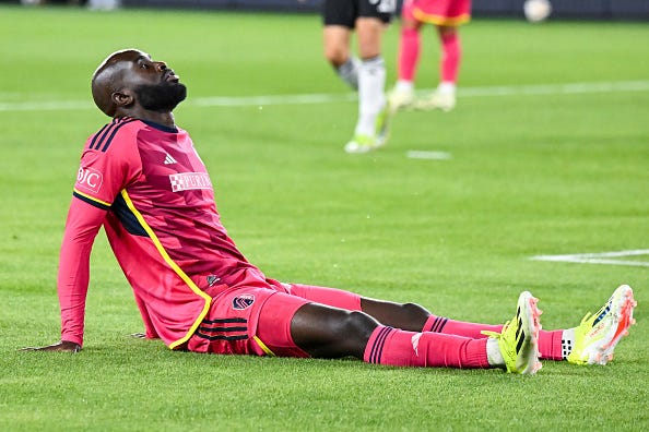 MAR 23: St. Louis City forward Samuel Adeniran (16) sits on the ground and reacts after missing a close shot during a MLS regular season game between DC United and St. Louis CITY SC on Mar 23, 2024, at CITYPARK Stadium