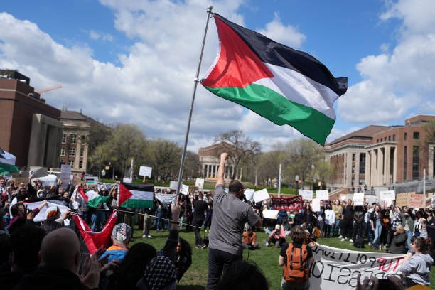 Pro-Palestine supporters chant during a rally against the Israel-Hamas war in Gaza on the University of Minnesota campus.