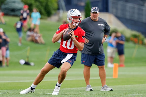 Drake Maye and Alex Van Pelt