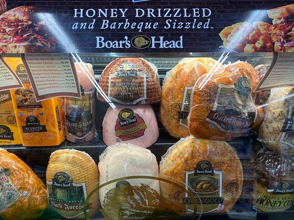 Boar's Head Deli meats in a grocery display case