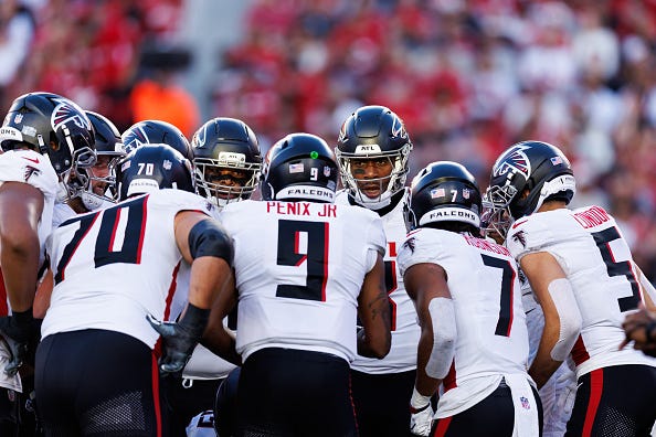 Atlanta Falcons huddle