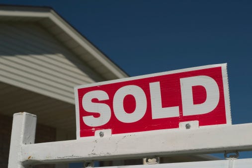 Investors buy tony Clarence Center townhome complex,