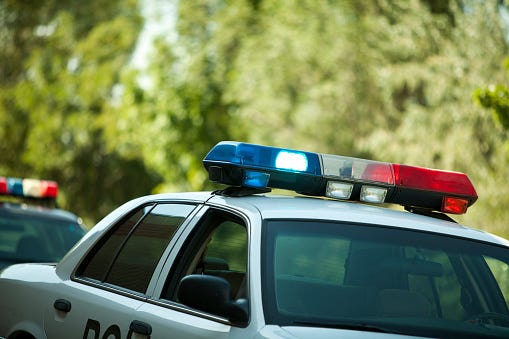 A police car with its lights on 