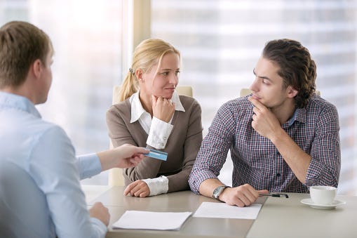 Couple Getting A Bank Account