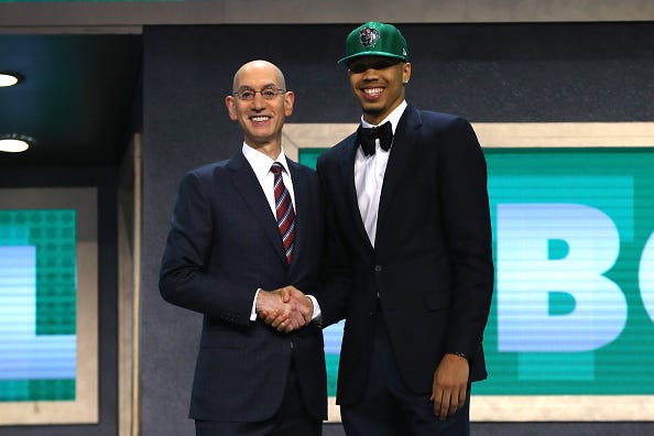 Jayson Tatum and Adam Silver