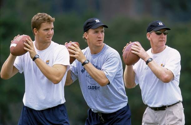 Eli Manning, Peyton Manning, Archie Manning at the Manning Passing Academy
