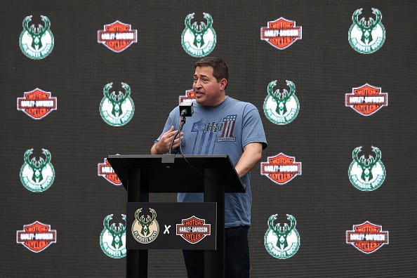  Milwaukee Bucks president Peter Feigin and representatives from Harley-Davidson announce and unveil the team's new uniforms featuring the Harley-Davidson logo as part of their new sponsorship agreement during a press conference at the Harley-Davidson Museum on August 10, 2017 in Milwaukee, Wisconsin