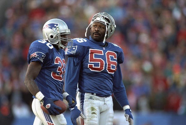 Andre Tippett and Corwin Brown