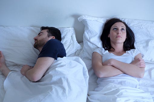 A Woman Has Trouble Sleeping