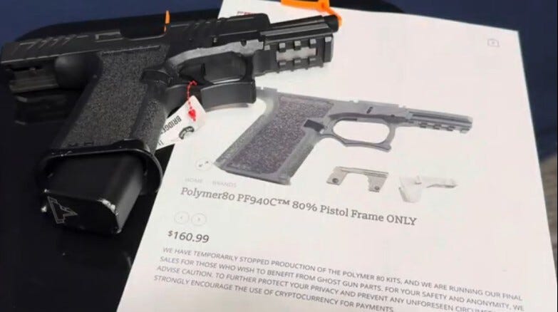 A fully assembled ghost gun rests on a manual that teaches how to build a ghost gun