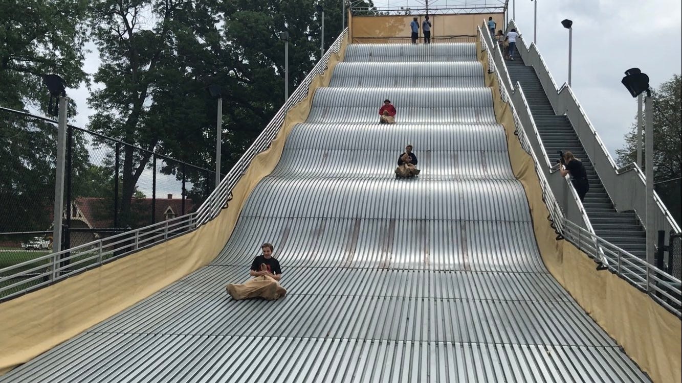 People from all over visit Detroit's Belle Isle to ride infamous Giant Slide, reopened to public