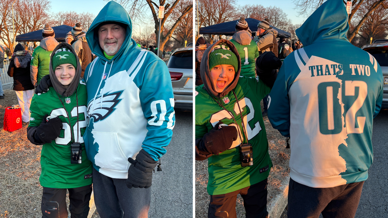 Tom Gibbons and his daughter, Emily, show off the custom Super Bowl-winning shirt he had made before the Eagles won the title.