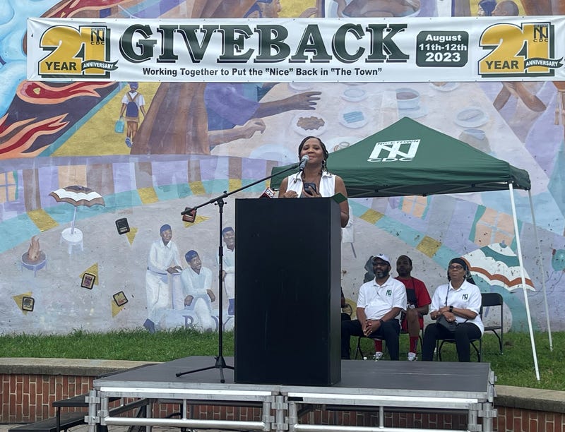 Woman speaking at Nicetown Give Back Festival announcement