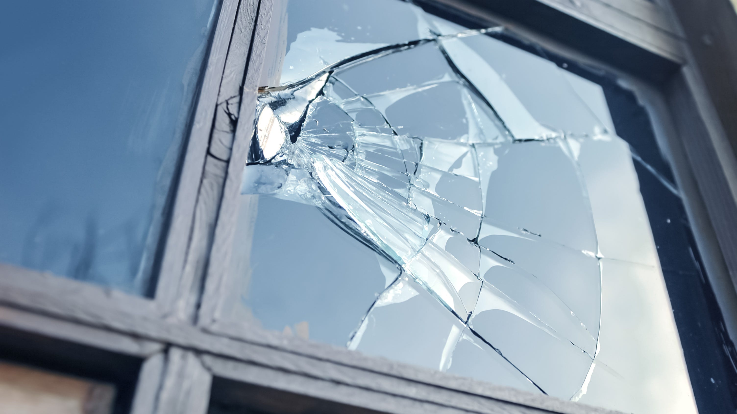 Burglars smash several windows, doors in a suburban downtown
