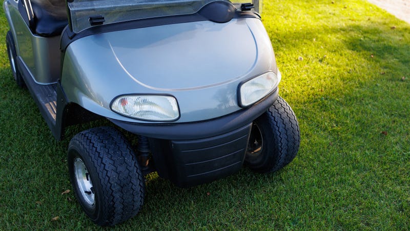 A golf cart - stock photo