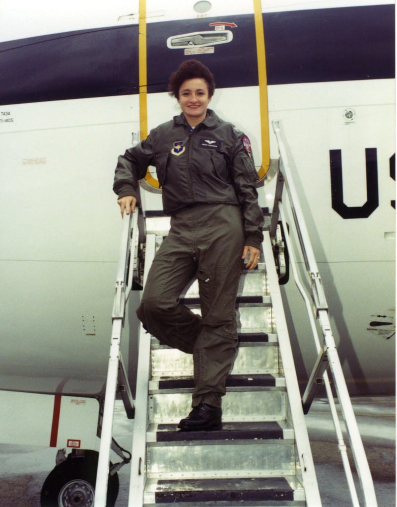 Graciela on T-43 stairs, UNT graduation day