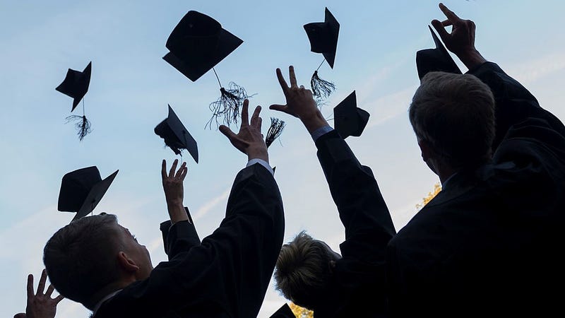 Graduates in gown and caps celebrate their graduation at the HHL Leipzig Graduate School of Management on August 30, 2014 in Leipzig, Germany.