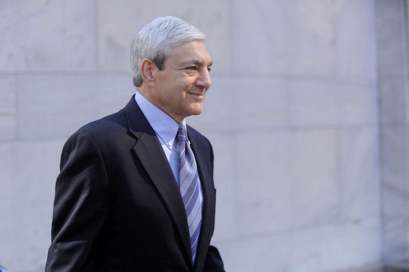 Former Penn State president Graham Spanier leaves his preliminary hearing in Harrisburg, Pennsylvania, Monday, July 29, 2013.