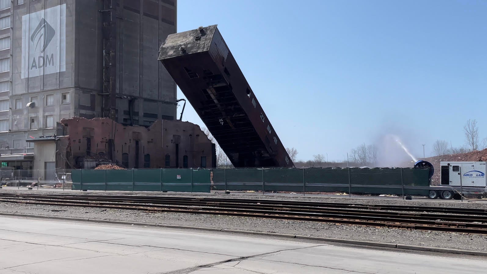 BOOM! Final piece of Great Northern grain elevator comes tumbling down