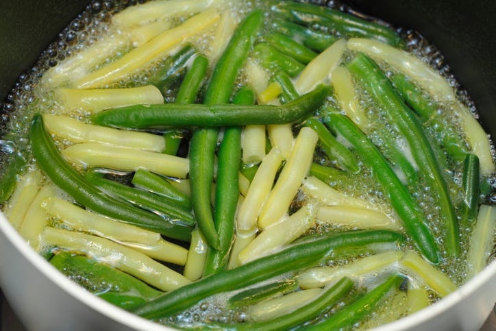 green beans boiling in a pot